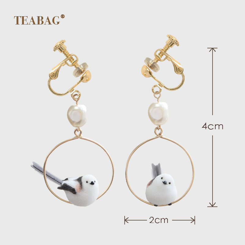 Pair of Little Bird earrings with matching adjustable clip-on fittings, one side-facing bird and one tilted-head bird. Original size guide shows a 4 cm total drop and 2 cm hoops.
