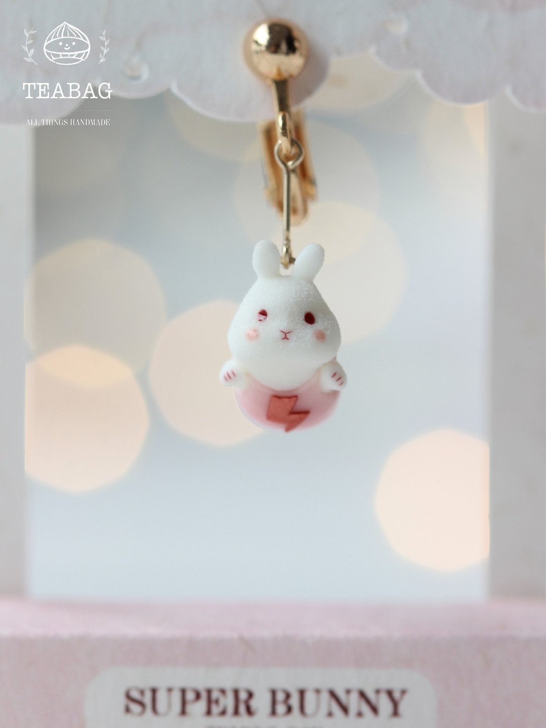 Front view of the miniature flying bunny with its short clip-on fitting.