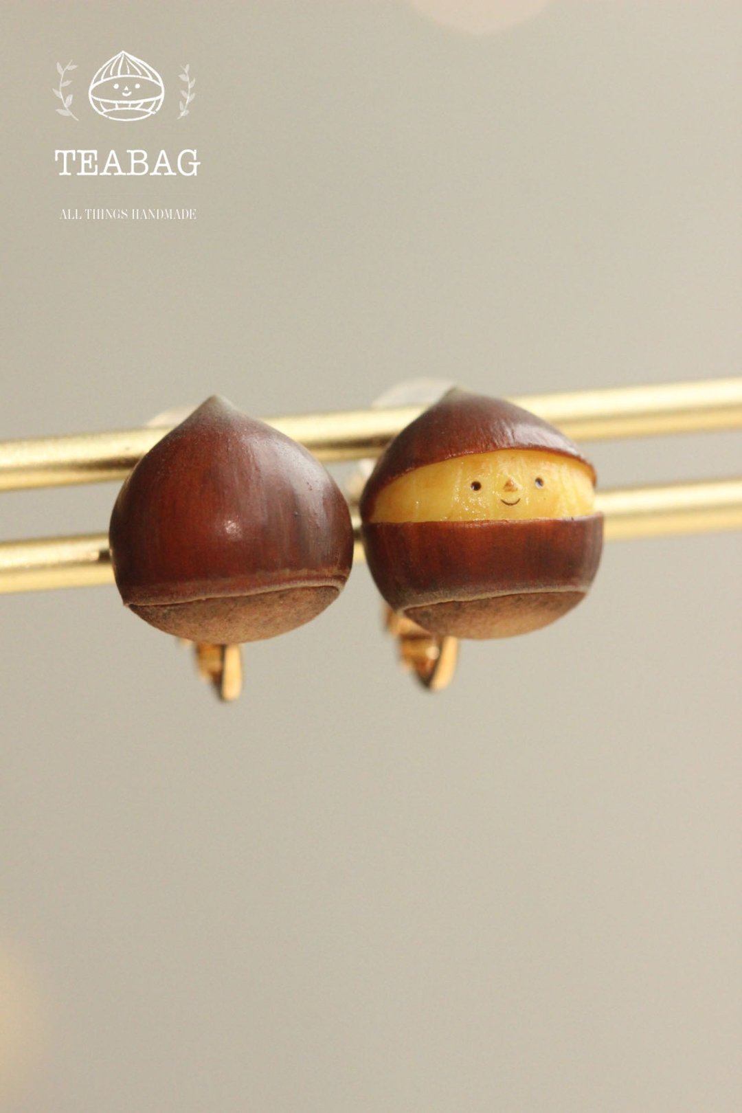 Two handmade smiling chestnut earrings